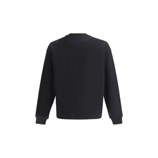 Back view of Moschino Teddy Bear Sweatshirt with ribbed cuffs and hem in black cotton, displaying a simple, elegant design.