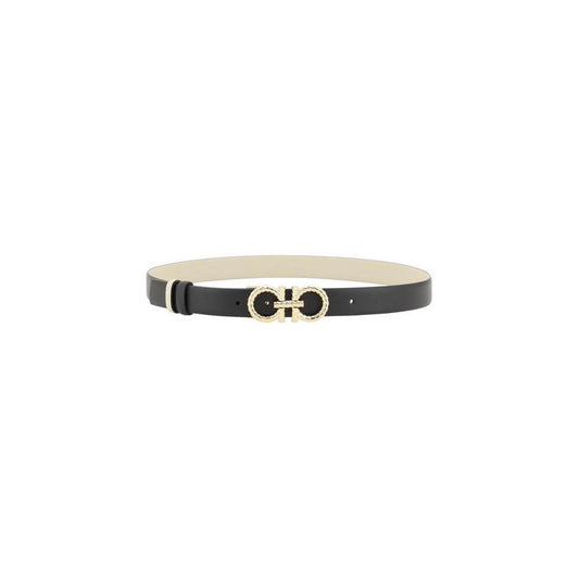 Ferragamo Gancini reversible leather belt with 3D buckle featuring iconic Gancini logo and snakeskin scales, versatile monochrome design.