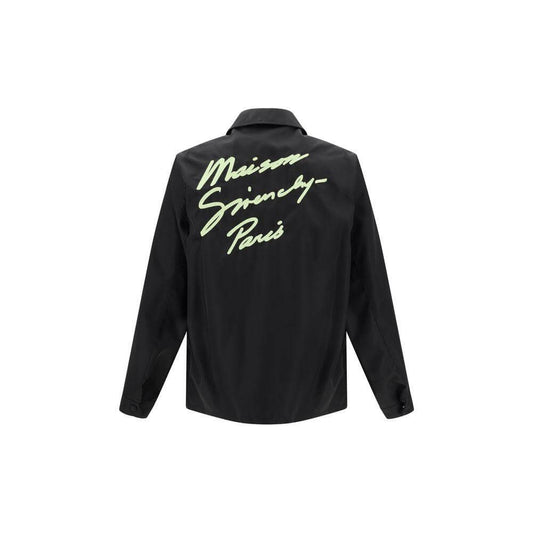 Black Givenchy oversized shirt with iconic monogram embroidery on the back, classic collar, and adjustable cuffs for a modern style.
