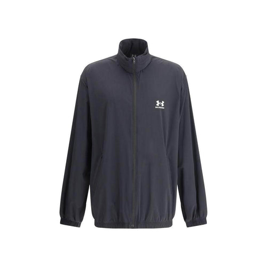Alt Tag: Black Balenciaga jacket with front zipper, built-in hood, elasticized hem and sleeves, brand monogram, oversize fit.