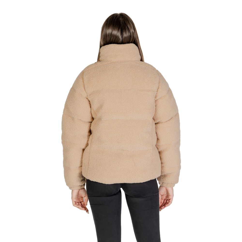 Back view of Columbia Beige Nylon Coat with soft Sherpa lining, ideal for cold weather comfort and style.