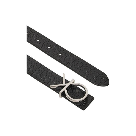 Calvin Klein black leather belt with CK logo buckle, reversible design, elegant accessory for versatile style and various occasions.