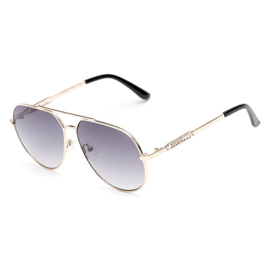 Guess women's gold metal sunglasses with grey lenses, style GF6195-5632B, featuring a 56/12/140 mm frame size.