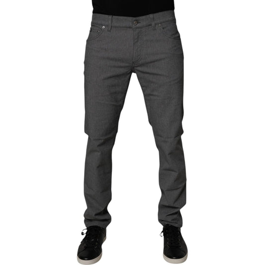 Dolce & Gabbana gray cotton stretch skinny denim jeans with button closure, skilled craftsmanship, made in Italy.