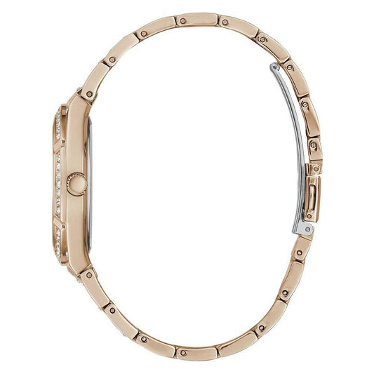Side view of Guess multicolor stainless steel quartz watch with pink case and bracelet, mineral glass, pressure closure.