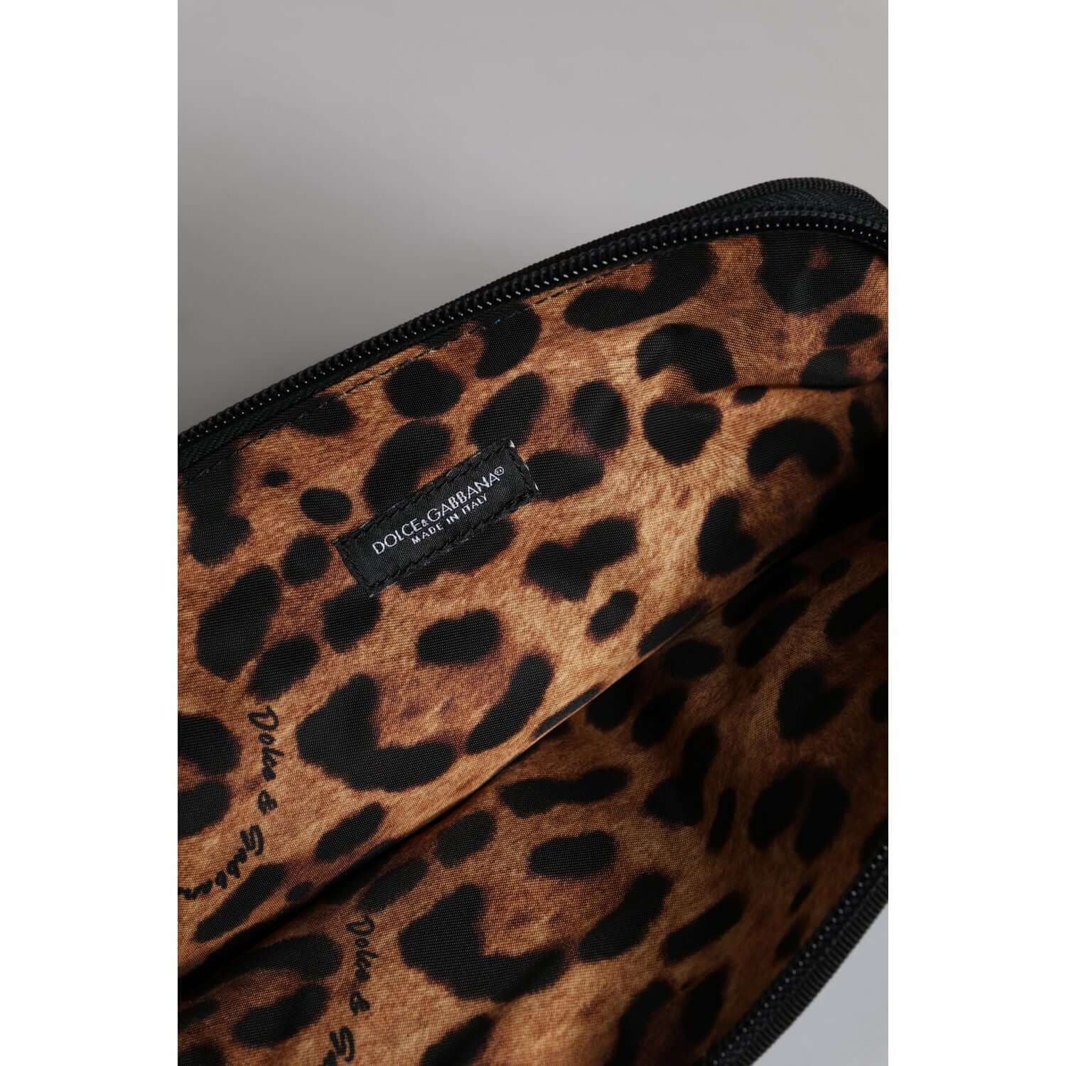 Front view with bag zipped and handles upright.