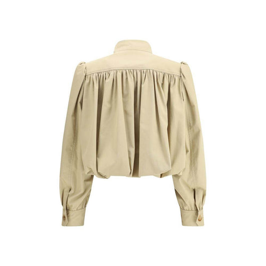 Back view of Chloé cropped cotton jacket with ruffle details and mandarin collar, showcasing its bold and modern oversized design.