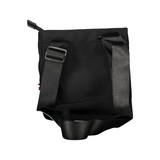 Tommy Hilfiger black recycled polyester shoulder bag with adjustable strap and zip closure, featuring the brand logo.