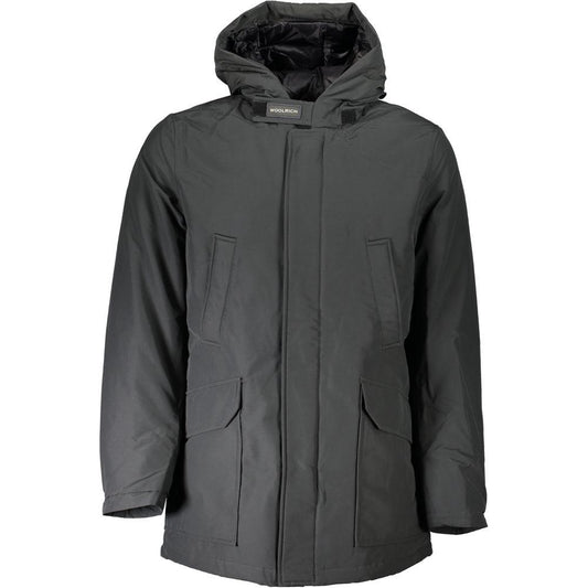 Woolrich gray cotton men's jacket with hood, four pockets, and zip-button closure, offering style and functionality.