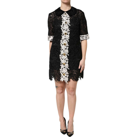 Dolce & Gabbana black floral lace embellished sheath mini dress, front view, featuring intricate detail, high craftsmanship, made in Italy.