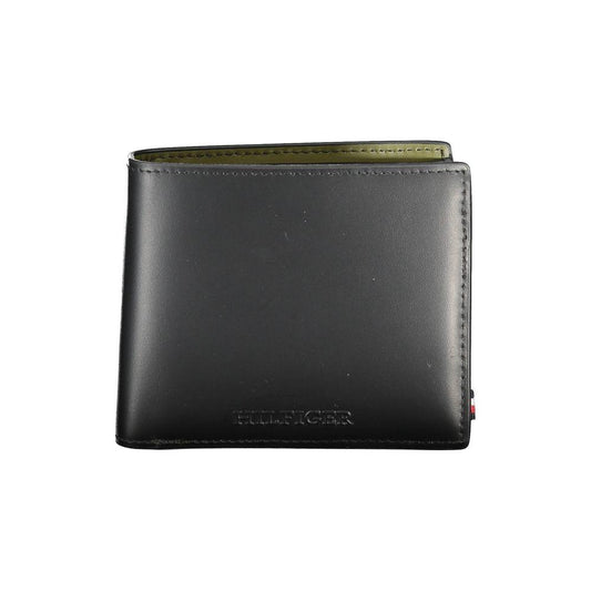 Tommy Hilfiger black leather wallet with two compartments, coin purse, card slots, contrasting details, and embossed logo.