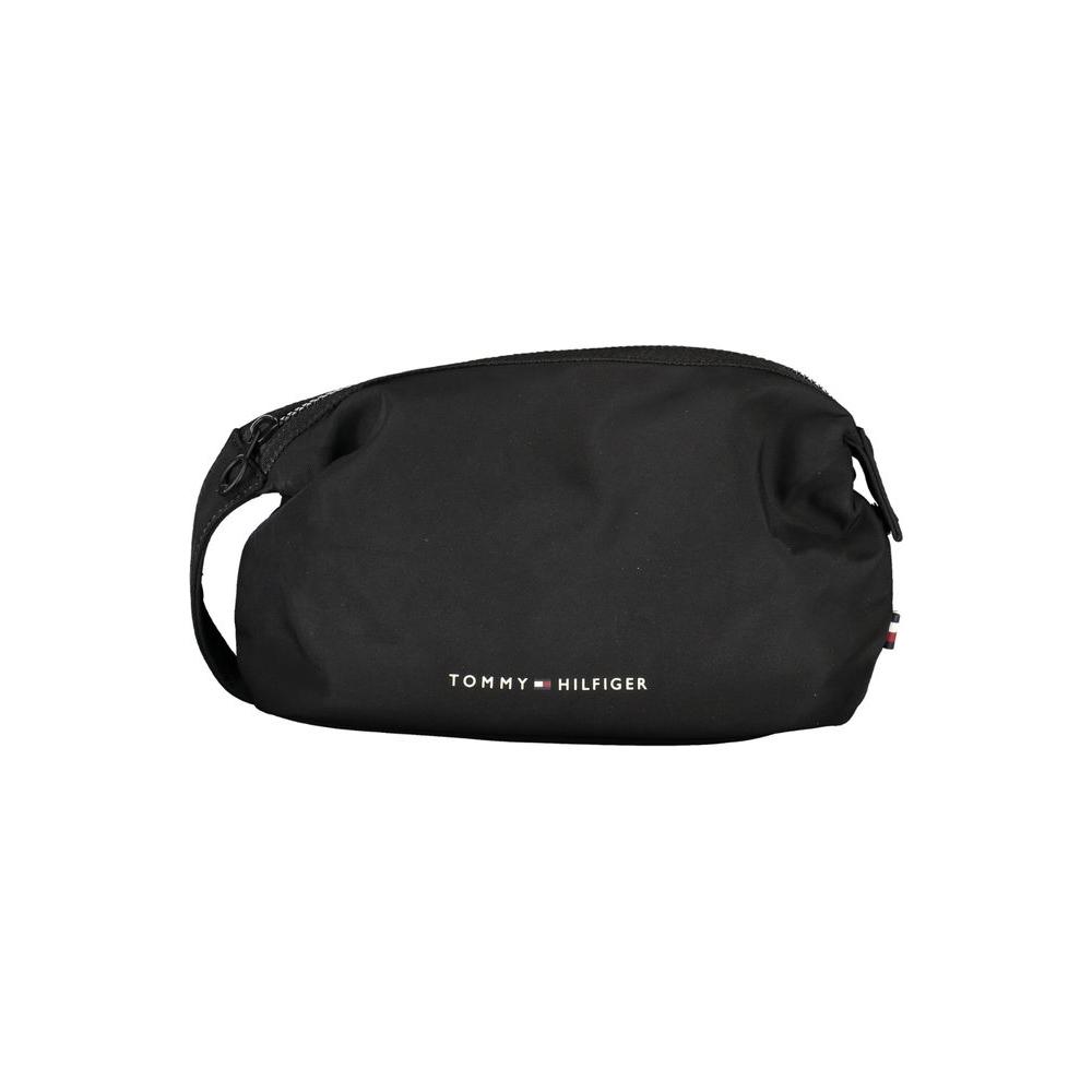 Front view with bag zipped and handles upright.