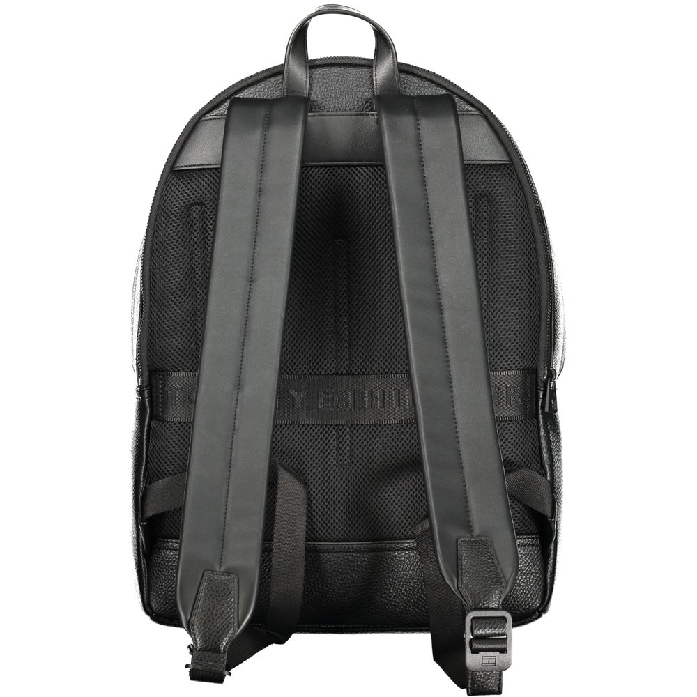 Back view of Tommy Hilfiger Black Polyester Men Backpack with adjustable shoulder straps and logo detailing.