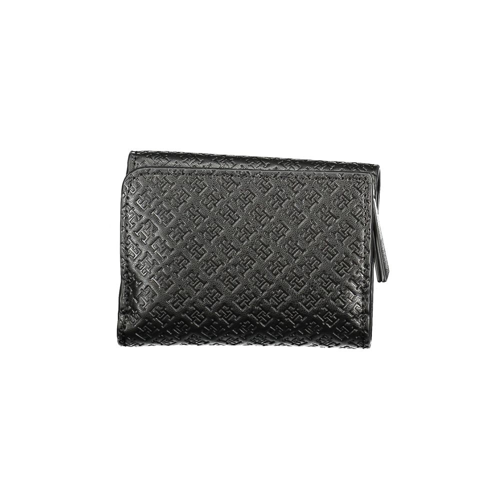 Tommy Hilfiger Black Polyethylene Women Wallet with textured design, featuring ample storage and secure closures, showcasing luxury and style.