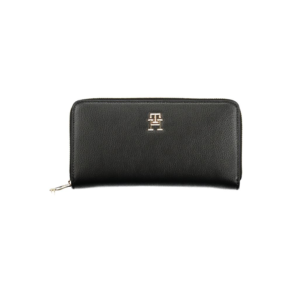 Tommy Hilfiger Black Polyethylene Women Wallet with zip closure and logo, featuring multiple compartments for cards and cash.