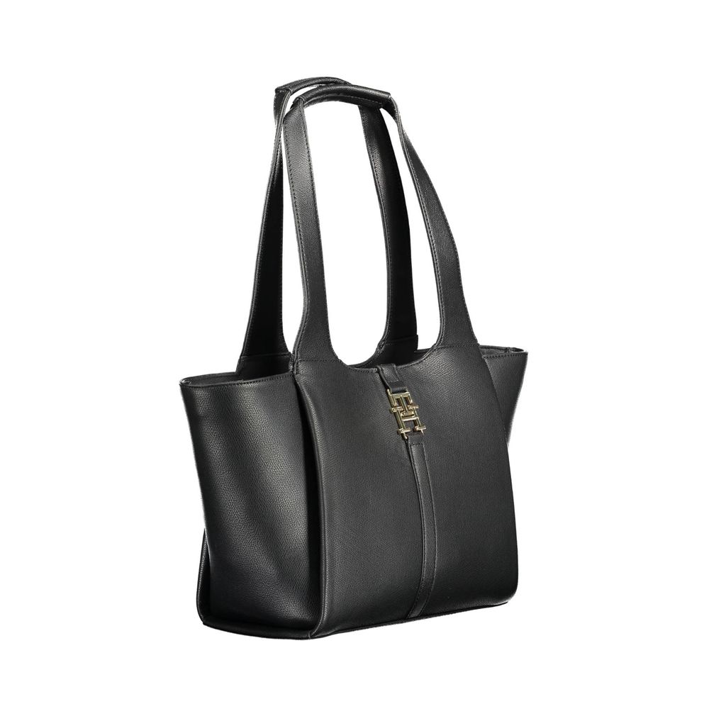 Front view with bag zipped and handles upright.