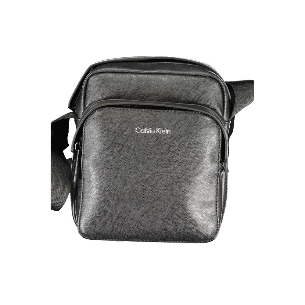 Calvin Klein Black Polyester Shoulder Bag with adjustable strap, external and internal pockets, zip closure, and logo detail.
