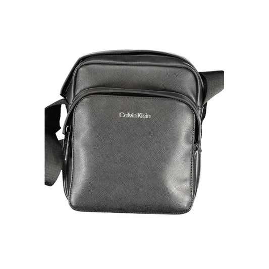 Calvin Klein Black Polyester Shoulder Bag with adjustable strap, external and internal pockets, zip closure, and logo detail.
