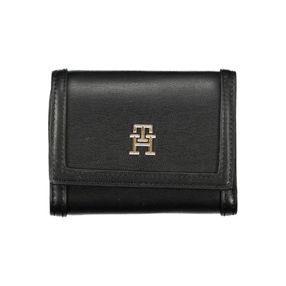 Tommy Hilfiger Black Polyethylene Wallet with logo, card slots, coin purse, contrasting details, zip and automatic closure.