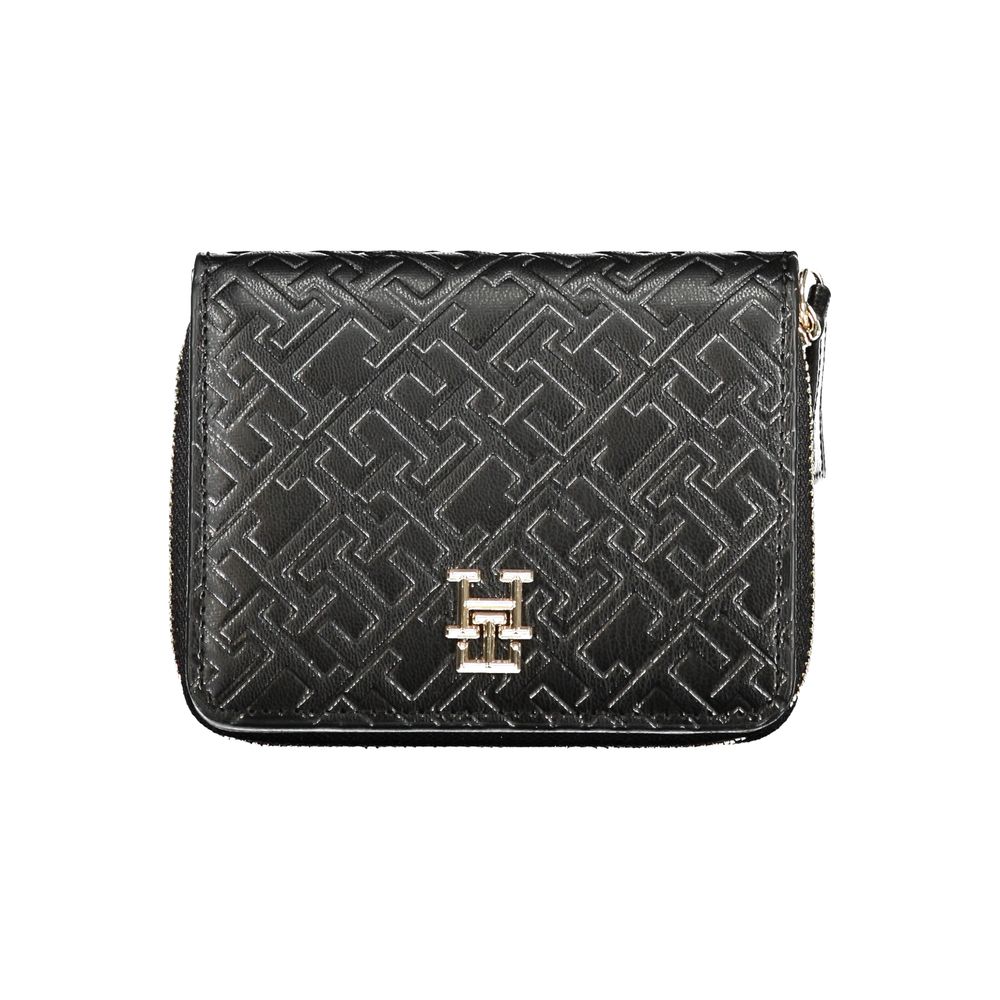 Tommy Hilfiger Black Polyethylene Wallet featuring coin purse, double card spaces, contrasting details, zip and automatic closure.