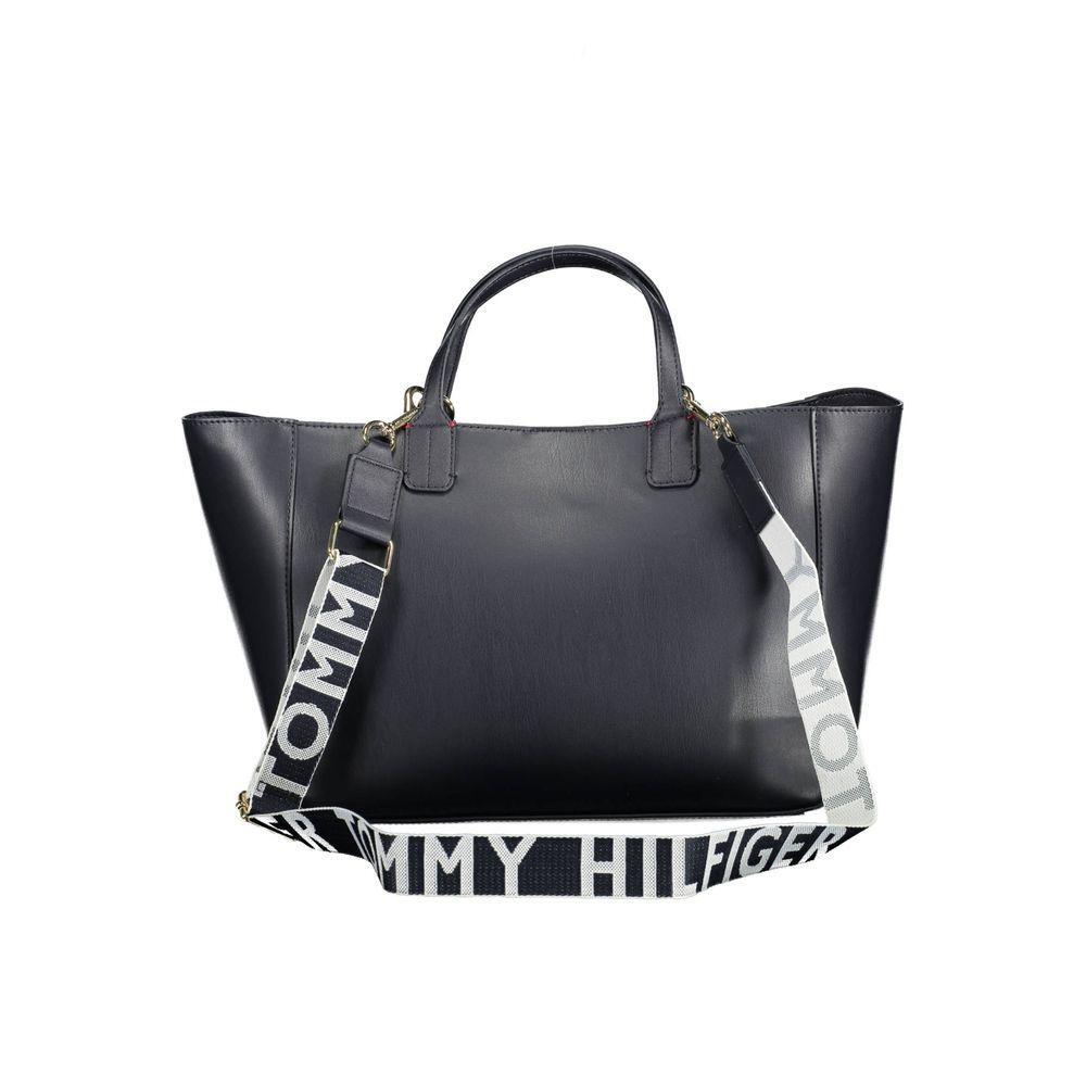 Front view with bag zipped and handles upright.