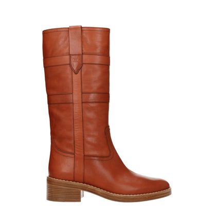 Celine Brown Leather Boots with vintage effect, mid heels, round toe, and cognac secondary color. Casual style leather footwear.