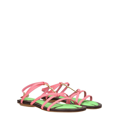 Jacquemus Pink Leather Flat Sandals with buckle closure and open toe design, featuring front logo and gold details.