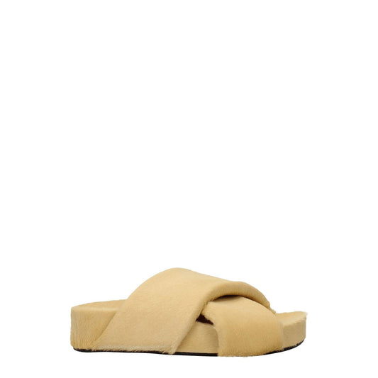 Jil Sander Beige Horsehair Slippers in pony skin with open toe design and leather sole. Casual style with low flat heel.