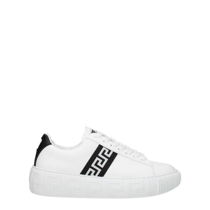 Versace White Leather Low Top Sneakers with front logo, lace-up closure, round toe, and rubber sole. Casual style with black accent.