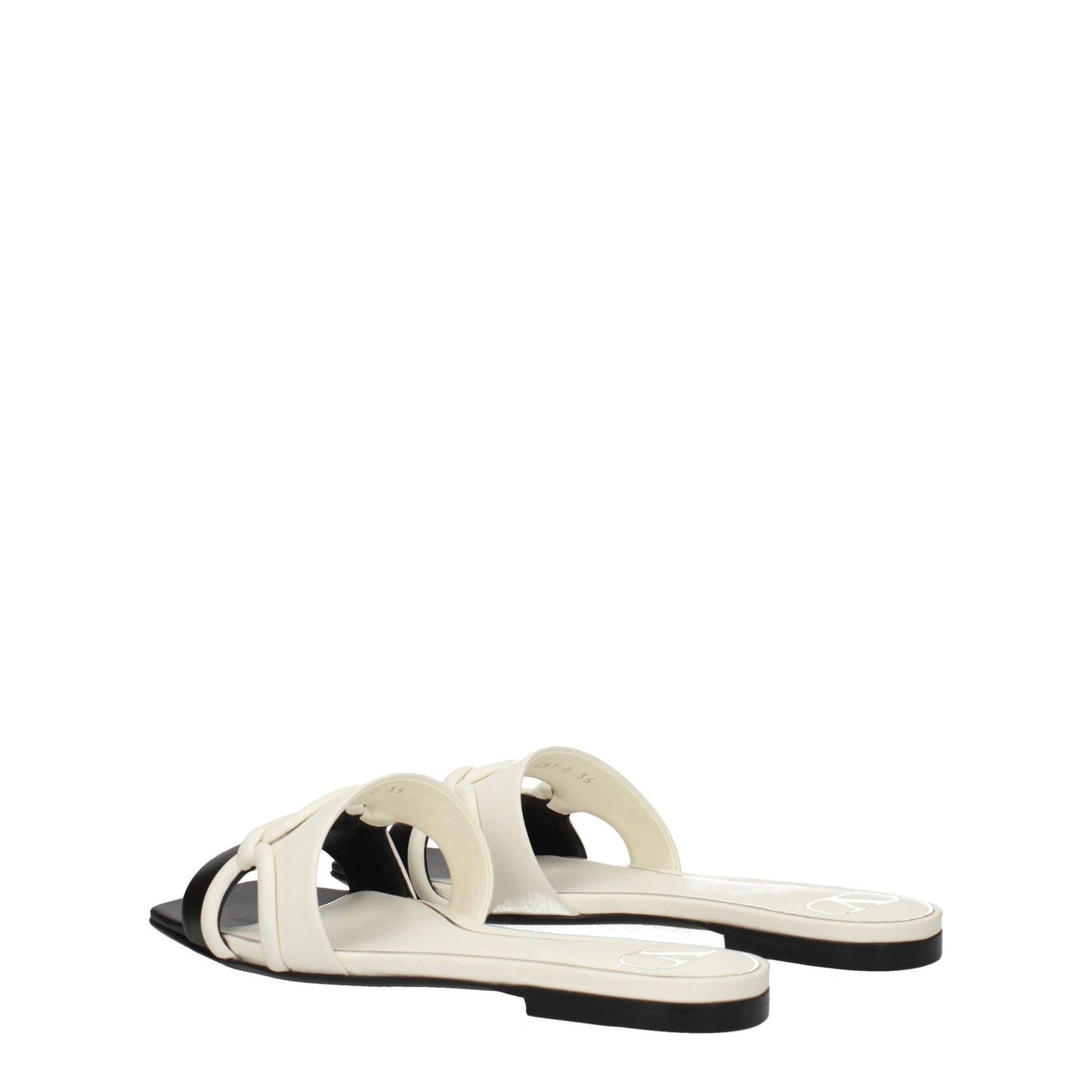 Valentino Garavani Black Leather Slippers with ivory accents and open toe design.