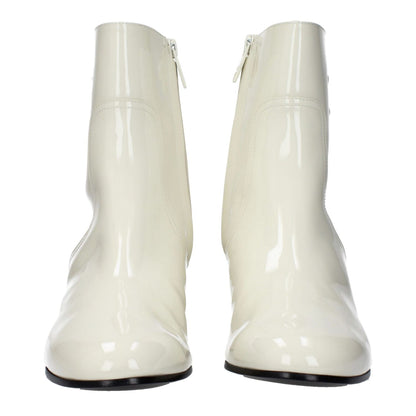 Celine Beige Leather Ankle Boots with zip closure, round toe, and mid heels, featuring a leather sole and side logo.
