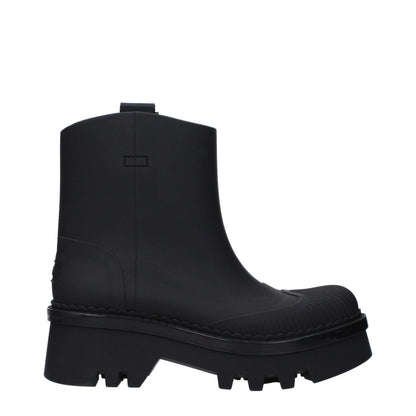 Chloé Black Cotton Ankle Boots with rubber sole and mid heels, featuring a back logo and round toe design.
