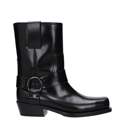Alt Tag: Valentino Garavani Black Leather Ankle Boots with studs, featuring a square toe and mid heels.