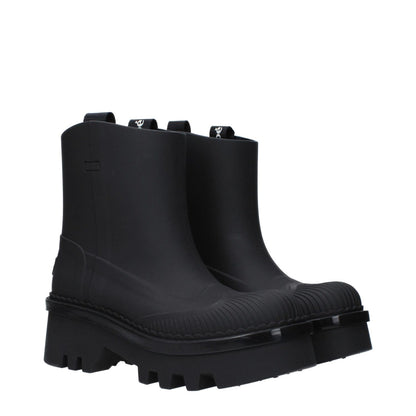 Chloé Black Cotton Ankle Boots with rubber sole, mid heels, round toe, and back logo. Stylish streetwear footwear.