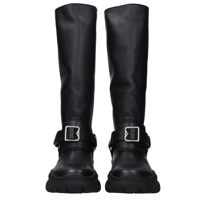 Burberry Black Leather Boots with silver front detail, vintage effect, rubber sole, mid heels, and round toe design.