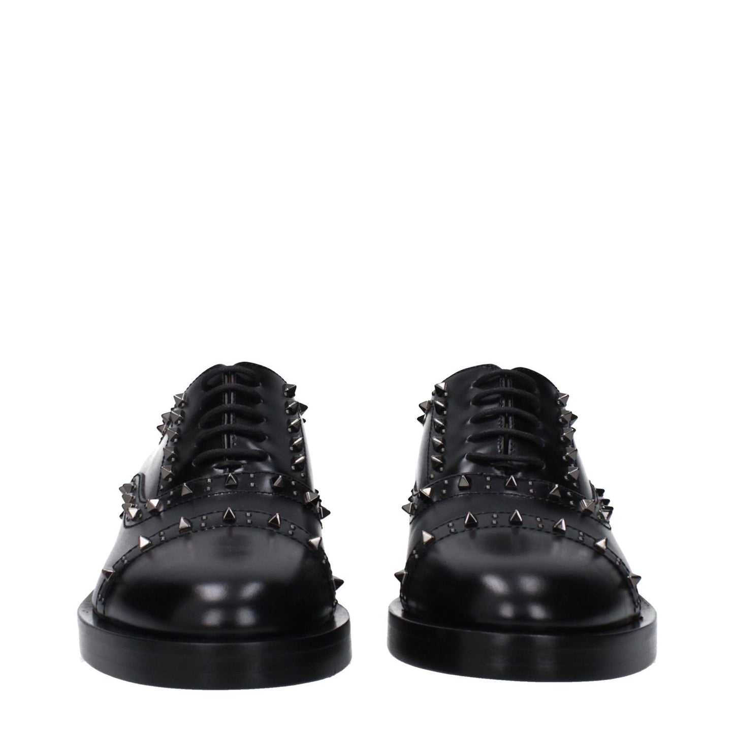 Valentino Garavani Black Leather Oxfords And Derbies with studs, lace-up design, casual style, leather sole, mid heels, and round toe.