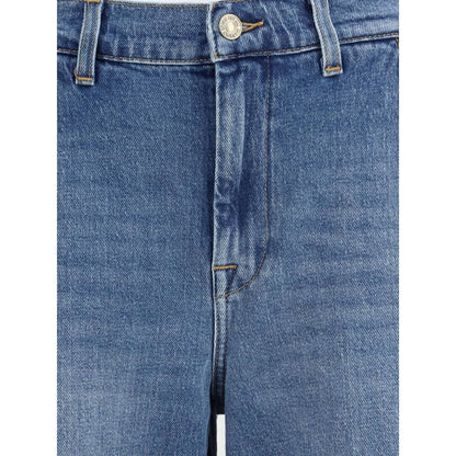 Close-up of 7FOR Light Blue Cotton Relaxed Fit Jeans showcasing mid-rise and classic design.