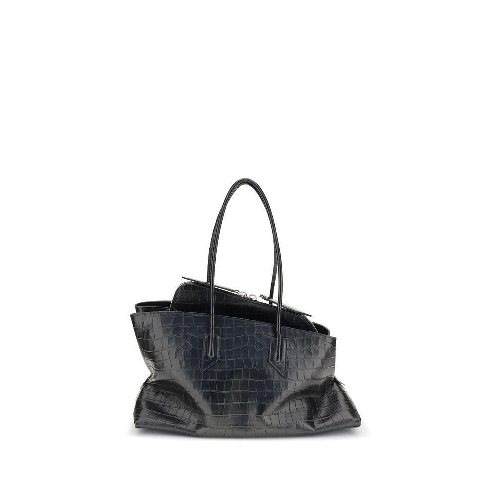 Front view with bag zipped and handles upright.