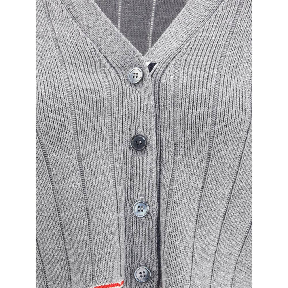 Thom Browne Gray Fleece Wool Cardigan with V-neck and button closure, ribbed design, and iconic colored bands detail.