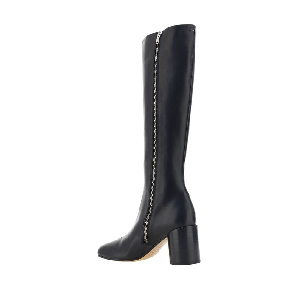 MM6 Black Calf Leather Bos Taurus Boots with iconic Tabi toe and side zip, knee-high design, cylindrical heel, made in Italy.