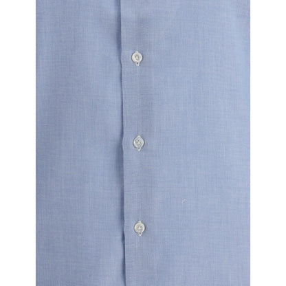 Close-up of Finamore Light Blue Cotton Dress Shirt with button detailing, made from fine cotton and cashmere blend.