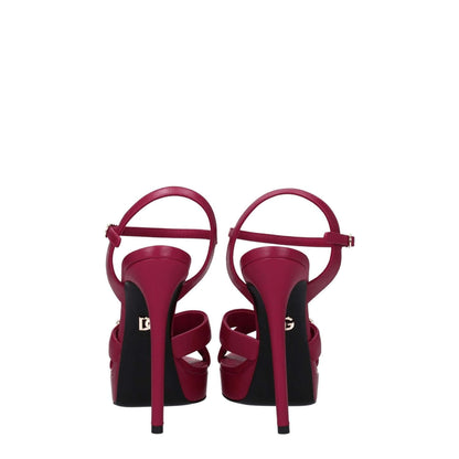 Dolce & Gabbana Pink Leather Platform Sandals with buckle closure and high heels, rear view showing the logo and open toe design.