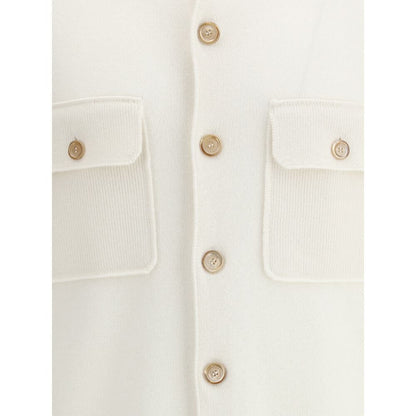 Close-up of Brunello Cucinelli White Cashmere Cardigan with ribbed collar, button closure, and patch pockets. Made in Italy.
