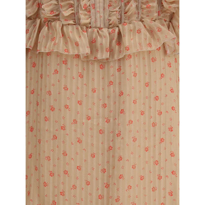 Close-up of vintage striped pattern and ruffles on Kristina Ti Multicolor Silk Long Dress, showcasing floral design and semi-sheer fabric.