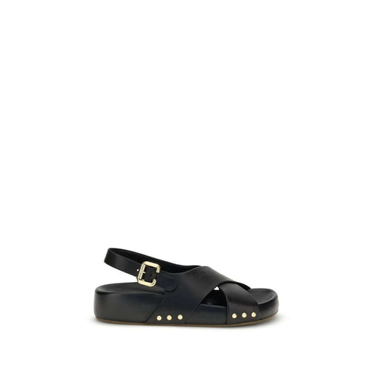 Chloé Mae Sandals with black straps, gold Paddington buckle, and studs, featuring a comfortable anatomical insole for AW25.