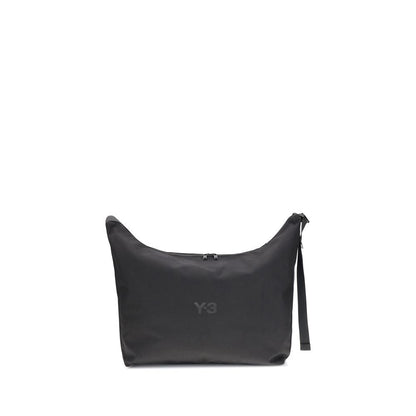 Y-3 Black Polyamide Shoulder Bag with adjustable strap and zip closure, featuring a printed logo on the front, designed for everyday use.