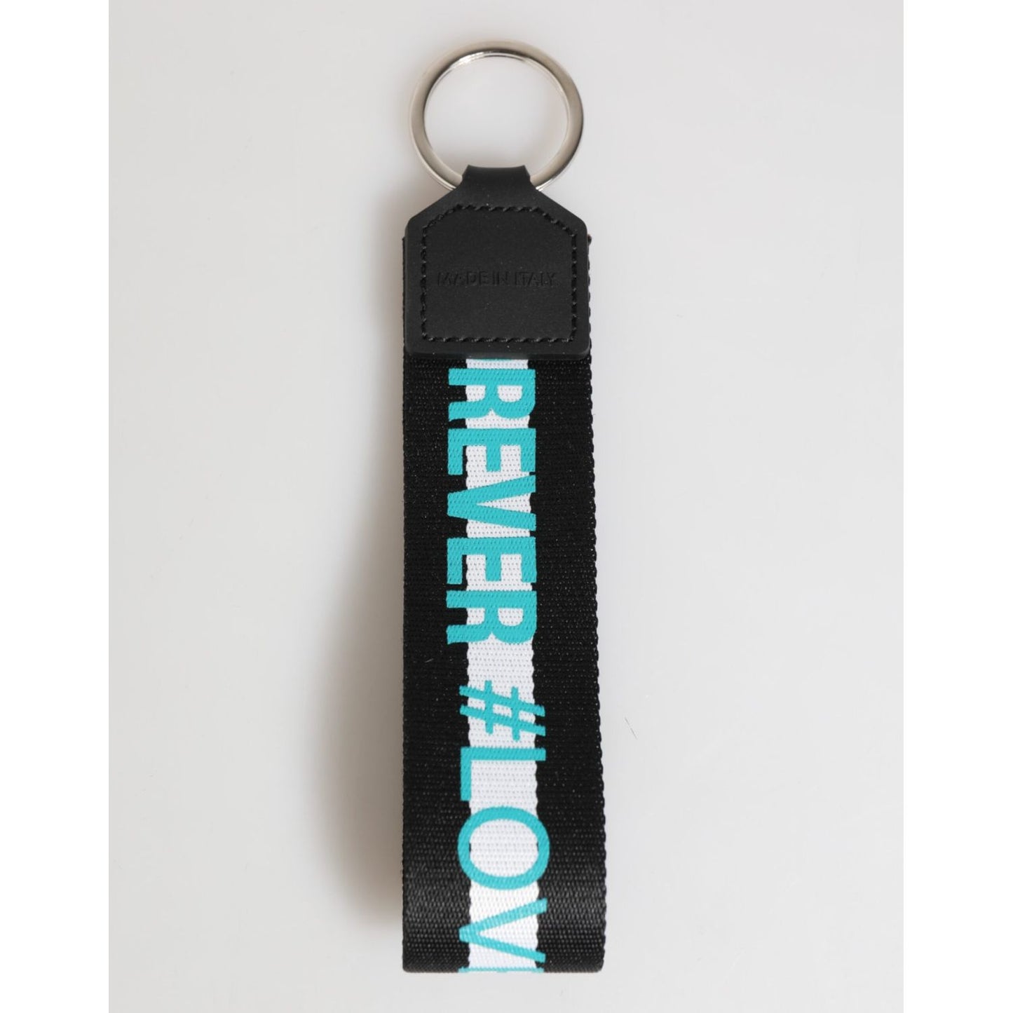 Black logo keychain with silver ring and strap saying 'REVER #LOVE' on a white background.