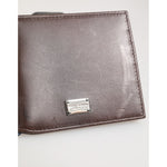 Dolce & Gabbana Brown Leather DG Logo Engrave Bifold Card Holder Wallet on display.
