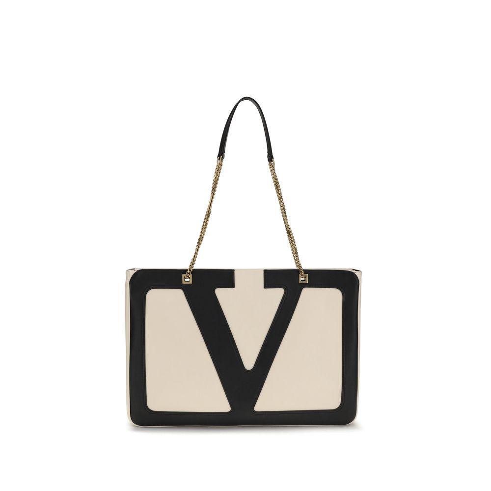 Front view with bag zipped and handles upright.