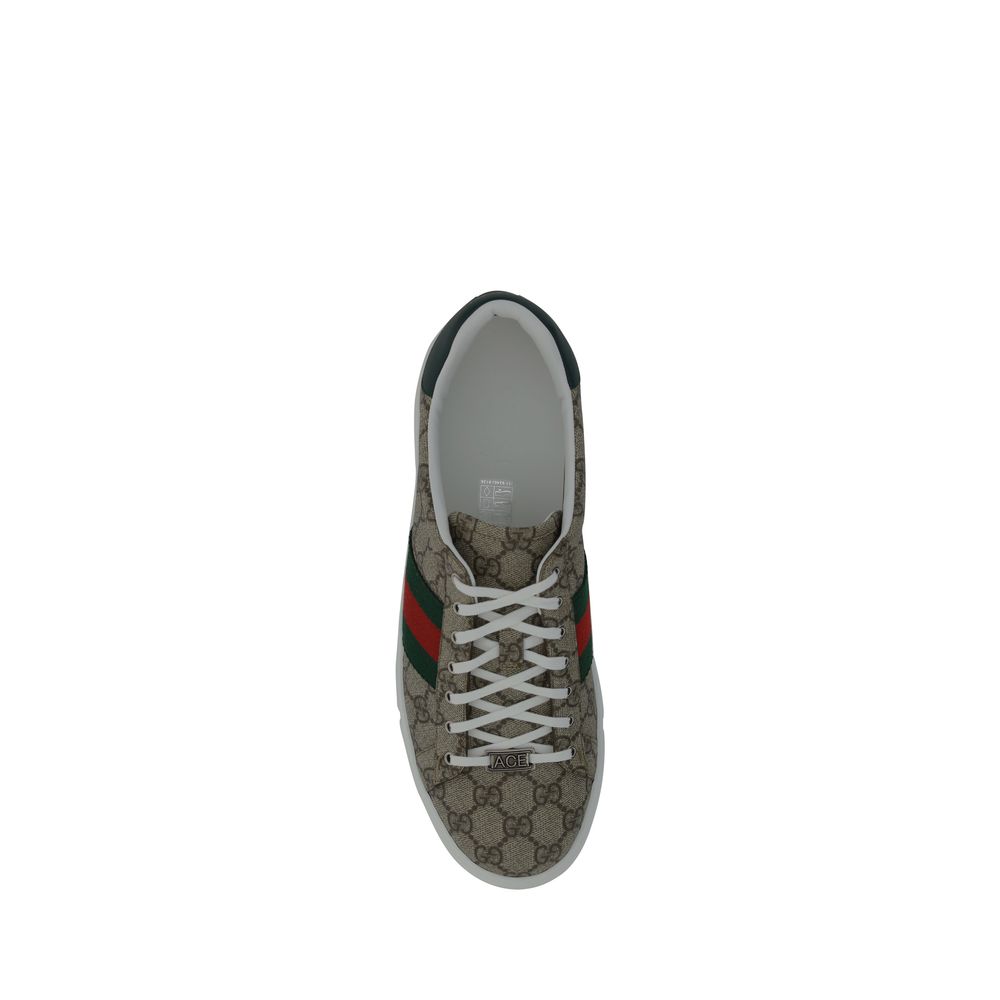 Top view of Gucci Beige Rubber Low Top Sneakers with lace-up closure, iconic GG jacquard, and leather back logo detail.